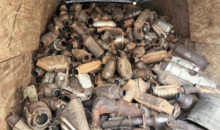 crate of used catalytic converters